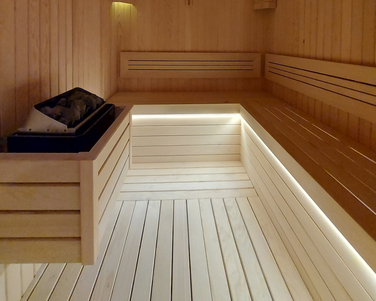 Warm cedar-lined infrared sauna cabin